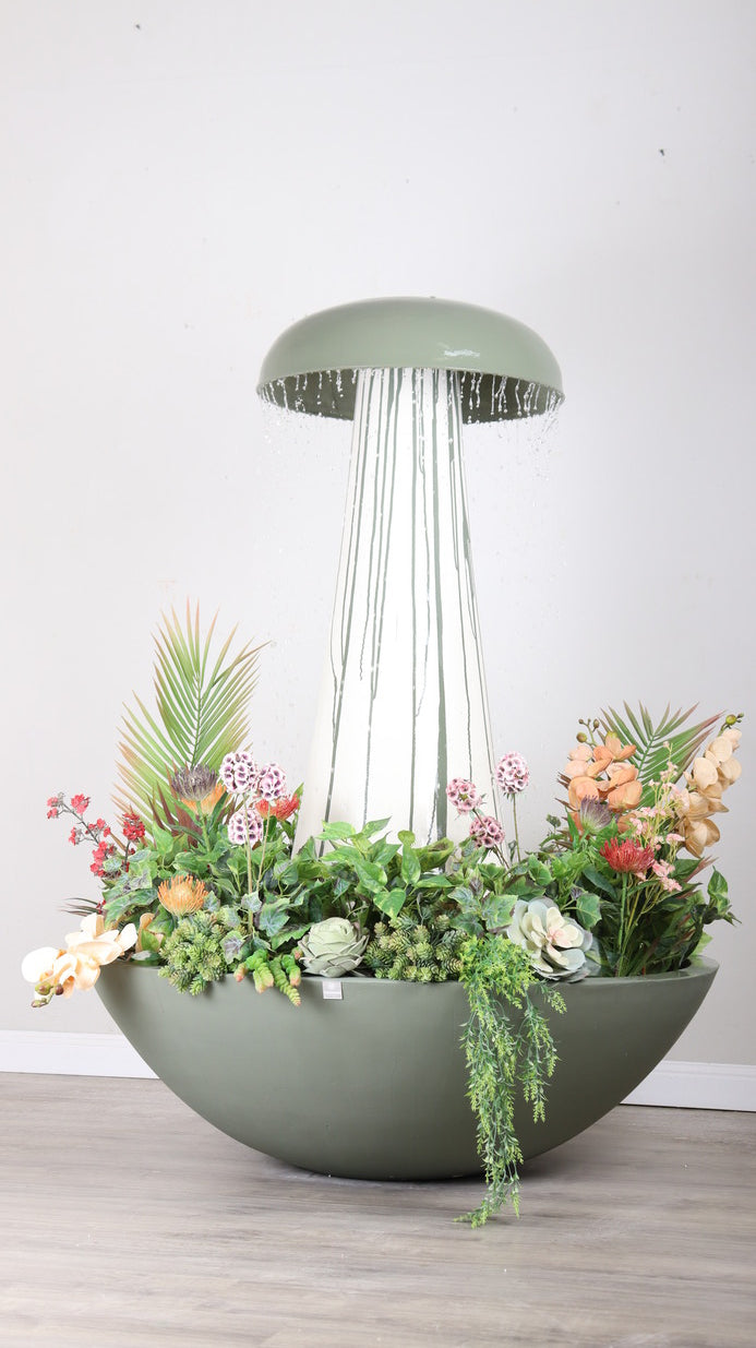 نافورة سيرام بتصميم دائري كبير يضيف هدوءاً للمكان